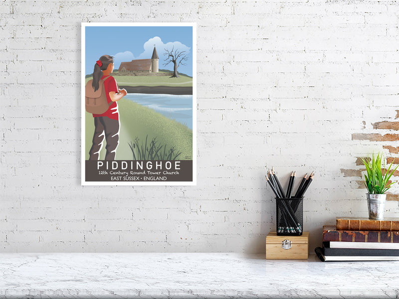 Artwork hanging on wall showing a hiker and Piddinghoe church in East Sussex