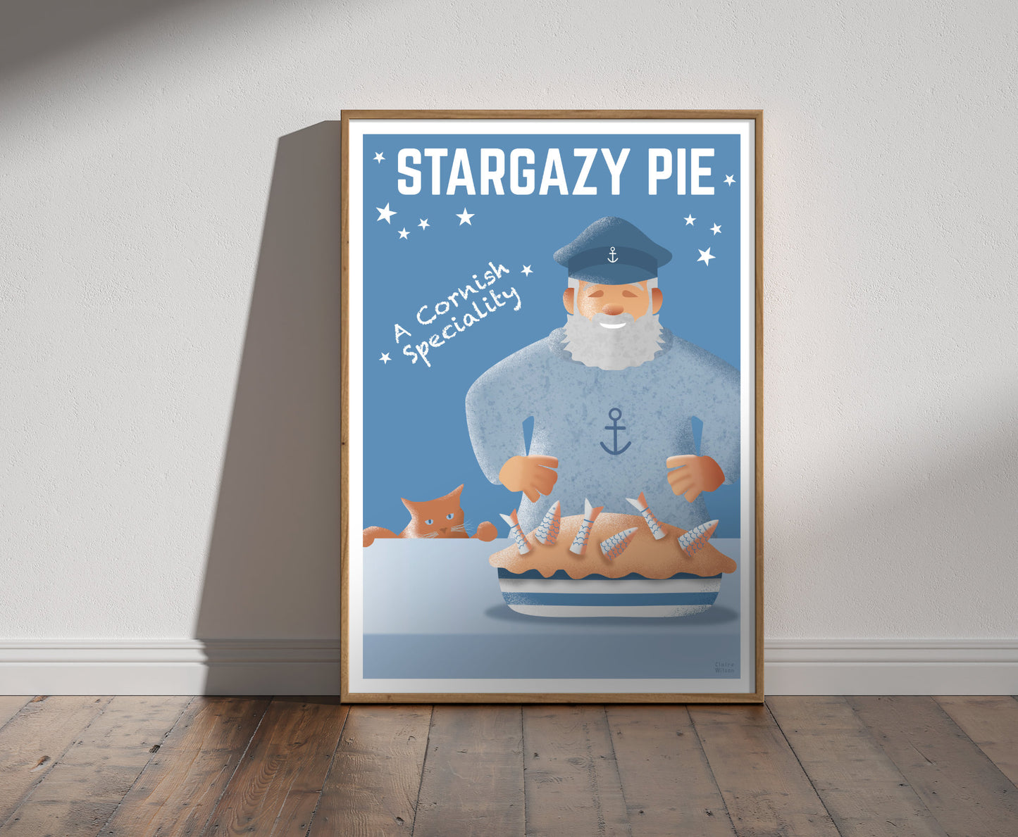 Framed illustration of a happy sailor in light blue sweater, and a pie with fish sticking out, with a hungry cat in background