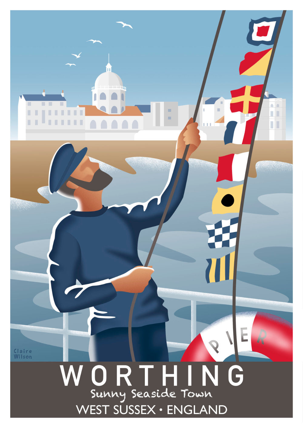 Colourful art print of a fisherman and nautical flags on a pier, with Worthing Dome Cinema and coastal buildings in the background