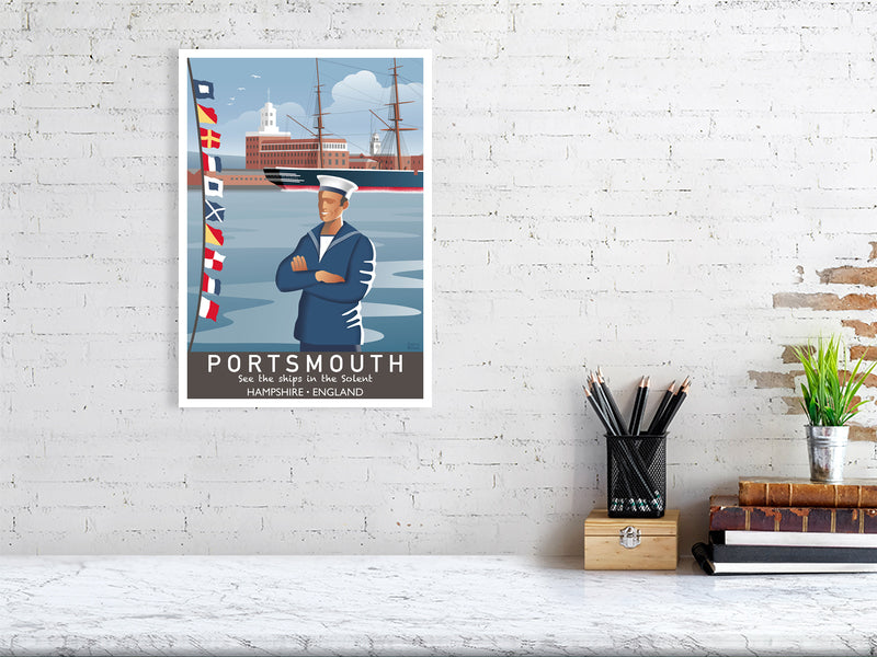 Artwork hanging on wall showing sailor and nautical flags at Portsmouth harbour