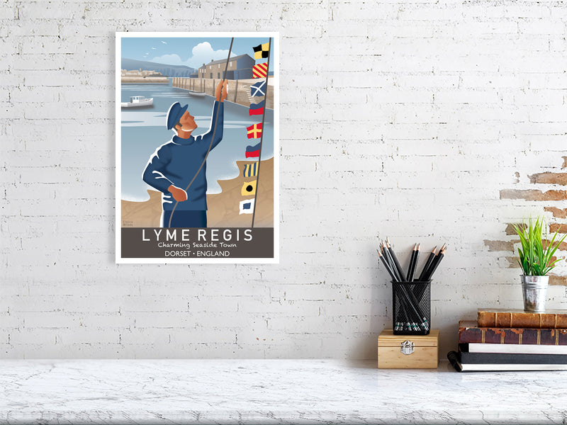 Artwork hanging on wall showing fisherman raising nautical flags at Lyme Regis