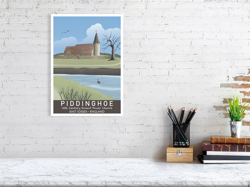 Artwork hanging on wall showing Piddinghoe church in East Sussex